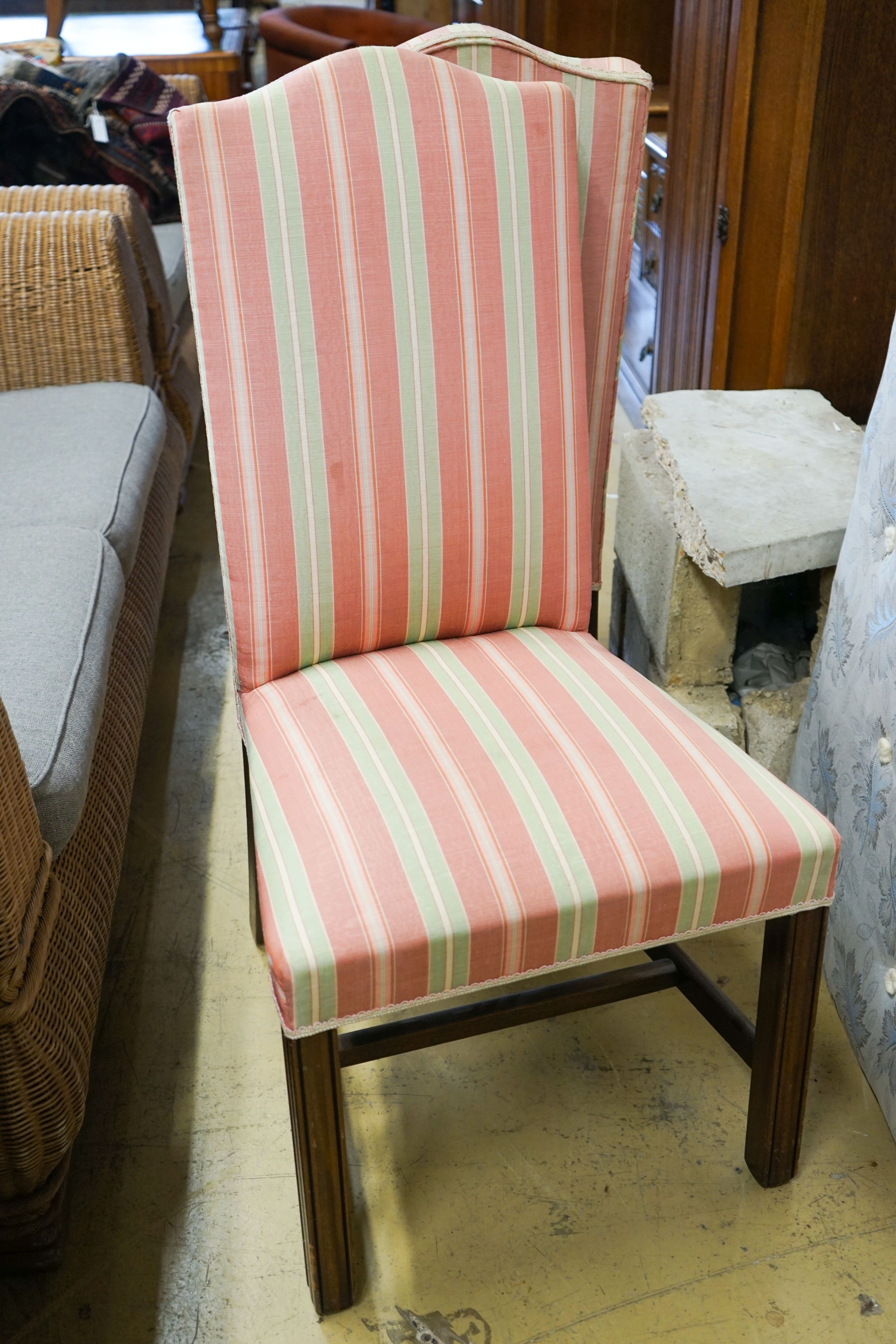 A set of fourteen reproduction George III upholstered dining chairs, width 54cm, height 110cm
